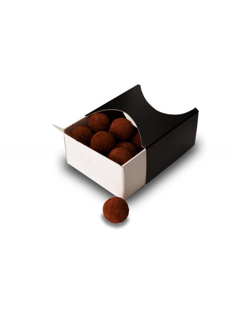 Truffes au chocolat au lait au cacao du Vénézuéla (43%), caramel, figue, cannelle et fève de tonka poudrées de cacao amer